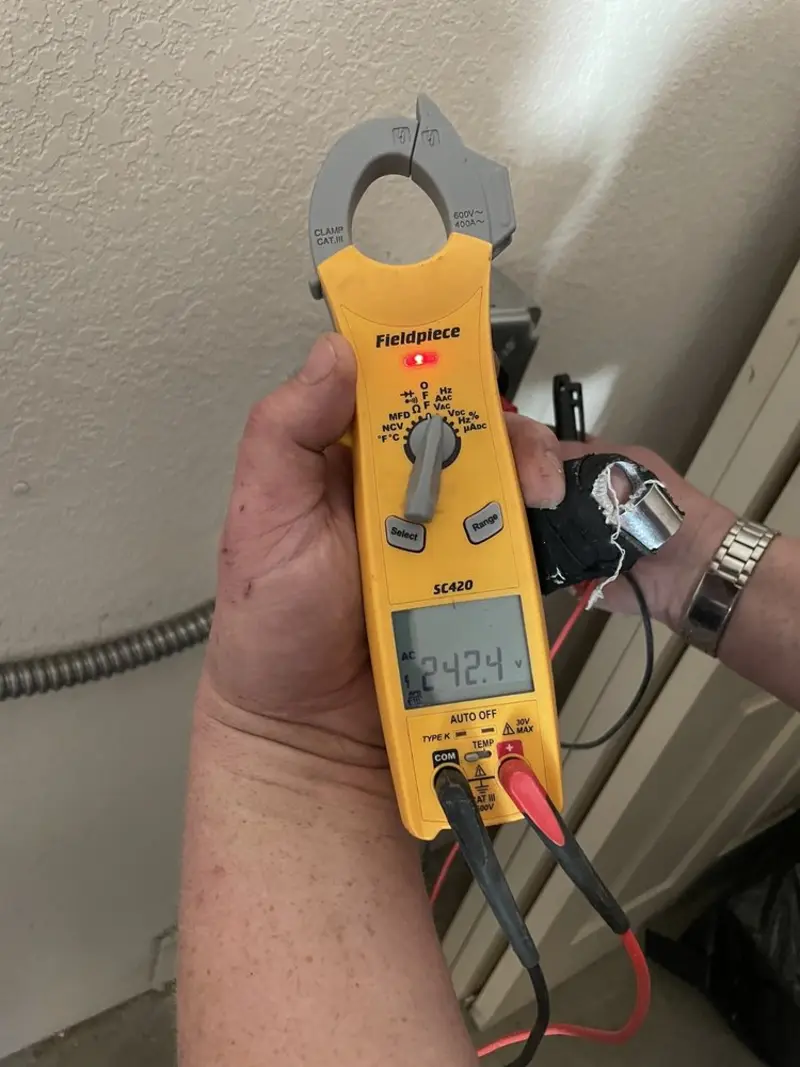 Voltage testing with clamp meter during Aluminum Wiring Replacement in Winthrop Harbor